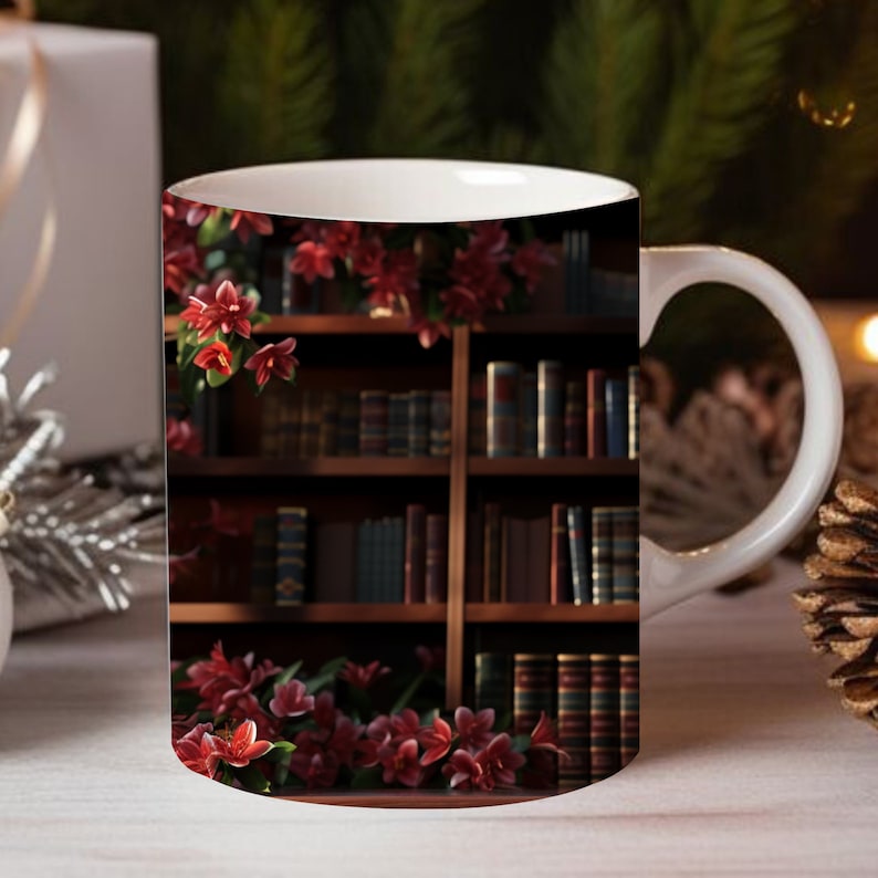May include: White ceramic mug with a design of a bookshelf filled with books and red flowers. The bookshelf is made of dark wood and the flowers are in bloom.