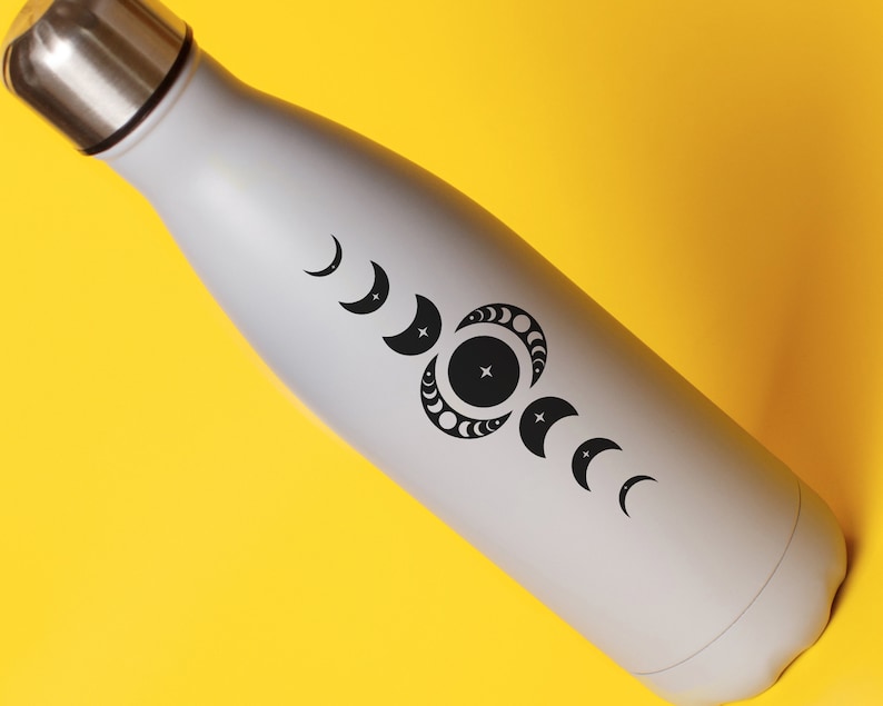 May include: A gray stainless steel water bottle with a black moon phase design. The bottle has a screw-on lid.