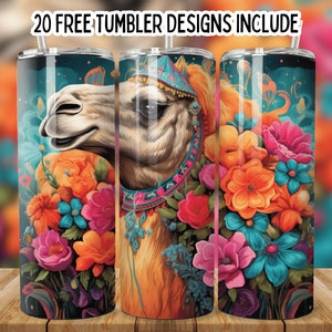 May include: A set of three stainless steel tumblers with a colorful design featuring a camel with a floral pattern. The camel is wearing a decorative headpiece and the flowers are in shades of orange, pink, blue, and green.