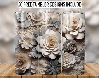 May include: Three stainless steel tumblers with a floral design. The tumblers feature a white and gray paper flower design.