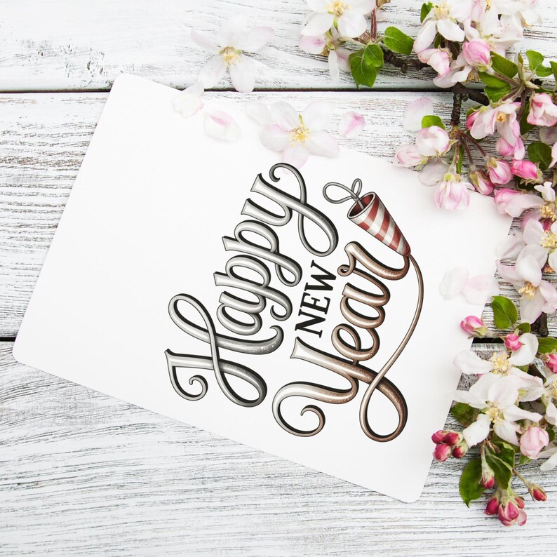 May include: A white card with the words "Happy New Year" in elegant script, accompanied by a festive firecracker illustration. The card is set against a backdrop of white wooden planks and delicate pink and white blossoms.