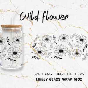 May include: Black and white graphic design of wild flowers with leaves. The design is for a 16 oz Libbey glass wrap. The text "Wild flower" and "SVG + PNG + JPG + DXF + EPS" and "LIBBEY GLASS WRAP 16OZ" are included in the design.