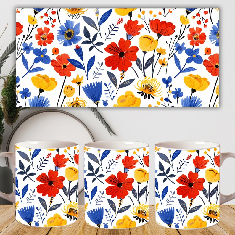 Peut inclure: Trois tasses en c&eacute;ramique blanche avec un motif floral. Le motif pr&eacute;sente des fleurs rouges, jaunes et bleues sur un fond blanc.