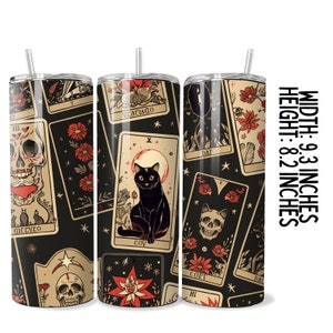 May include: A black and white stainless steel tumbler with a tarot card design. The tumbler features a black cat, skulls, flowers, and stars on a black background. The tumbler is 9.3 inches wide and 8.2 inches tall.