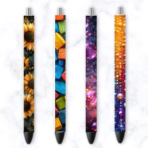 May include: Four pens with different colorful designs. The first pen has a sunflower pattern, the second has a colorful block pattern, the third has a purple and pink galaxy pattern, and the fourth has a rainbow bead pattern.