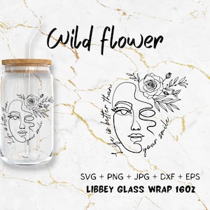 May include: A black and white line art design of a face with a flower in the hair. The design is on a clear glass jar with a bamboo lid. The text "Life is better than your smile" is written on the jar. The text "Wild flower" is written above the jar. The text "SVG + PNG + JPG + DXF + EPS" and "LIBBEY GLASS WRAP 160Z" is written below the jar.