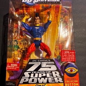 May include: A DC Universe Classics action figure of OMAC, packaged in a clear plastic case. The figure is in a dynamic pose, wearing a blue and red costume with yellow accents. The packaging includes text that reads "75 Years of Super Power" and "Includes Collector Button."