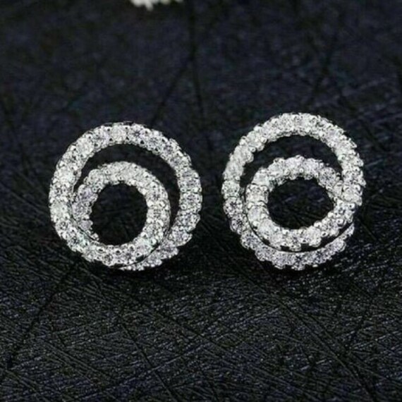 Spiral diamond earrings deals