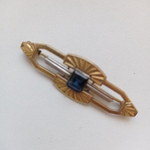 Vintage brooch with little stone on it.. beautiful brooch to offer