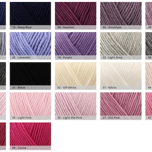 May include: A colour chart of yarn skeins in various shades. Colours include blue, navy blue, heather, amethyst, purple orchid mix, light lavender, lavender, purple, light grey, grey, dark grey, black, off white, white, powder pink, light pink, light old pink, old pink, pink, plum, and cerise.