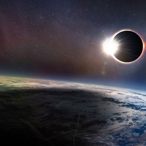 May include: A total solar eclipse with the sun's corona visible as a bright ring of light around the moon's silhouette. The Earth's atmosphere and clouds are visible in the foreground.