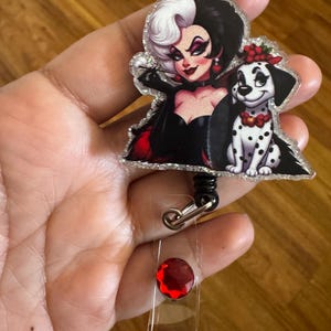 Cruella badge reel