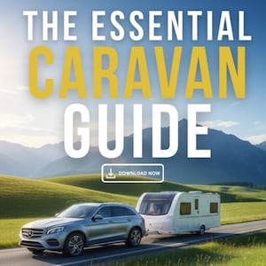 May include: Image of a silver SUV towing a white caravan on a paved road. The background features rolling green hills and mountains under a blue sky. Text at the top reads "THE ESSENTIAL CARAVAN GUIDE" with a "DOWNLOAD NOW" button.