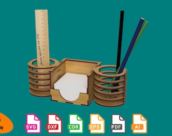 May include: A wooden desktop organizer with three compartments. The organizer has two pencil holders and a compartment for sticky notes. The organizer is made of light brown wood and has a ruler with the text "Wall Art and CNC Design" printed on it.