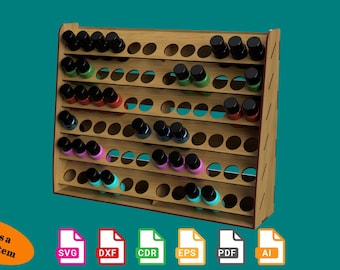 May include: A wooden shelf unit with multiple rows of holes to hold small bottles. The shelf is made of light brown wood and has a natural finish. The bottles are various colors, including black, blue, green, pink, and red.