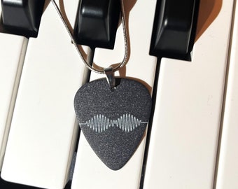 Scimmie artiche | Collana con plettro per chitarra