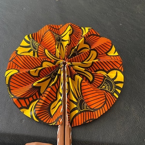 Fans in wax and imitation leather