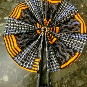 Wax and leather fan
