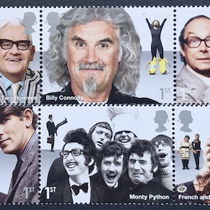 May include: A sheet of ten postage stamps featuring portraits of British comedians including Spike Milligan, Ronnie Corbett, Ronnie Barker, Billy Connolly, Morecambe and Wise, Norman Wisdom, Lenny Henry, Peter Cook, Dudley Moore, Monty Python, French and Saunders, and Victoria Wood.