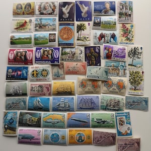 May include: A collection of vintage Bermuda postage stamps featuring various designs, including birds, ships, and the Bermuda coat of arms. The stamps are in different colours and denominations, and some have text that reads "Bermuda" and "Peace".