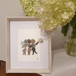 Three friends. Friendship.  Together. Pebble art. Pebble picture.