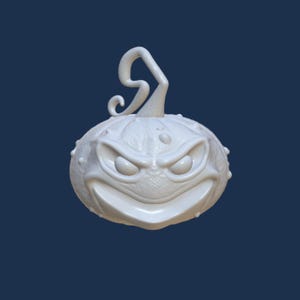 May include: A white ceramic pumpkin with a menacing grin and a twisted stem. The pumpkin has a textured surface and a detailed face.