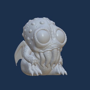 May include: A white 3D printed figurine of a cartoonish Cthulhu with large eyes and tentacles.