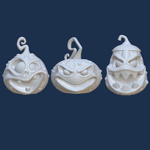 May include: Three white, cartoonish pumpkin sculptures with exaggerated facial features. Each pumpkin has a unique, expressive face, including gritted teeth, bulging eyes, and curved stems. The pumpkins are set against a dark blue background, perfect for Halloween decor.