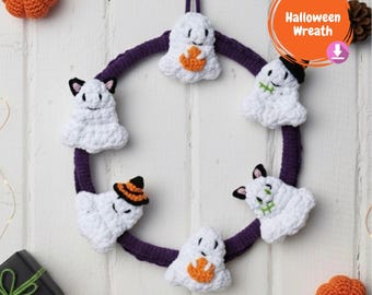 May include: A handmade Halloween wreath featuring crocheted white ghosts with various accessories, attached to a purple ring. The wreath includes a small orange pumpkin and the text "Halloween Wreath".