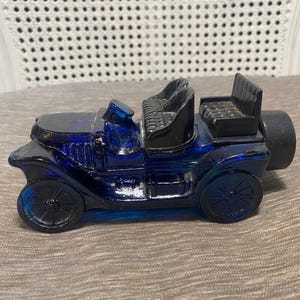 Vintage - jaren 70 - Avon - blauwe dune-buggy - sportrally-verstevigende lotion - volle fles - Keulen heren - verzamelobject - blauw glas