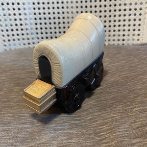 Vintage - Bottiglia Avon - Carrozza coperta - Profumo Wild Country - Carrozza in vetro marrone - Tappo bianco - Area bagagli dorata - Bagaglio dorato - Pieno di dopobarba