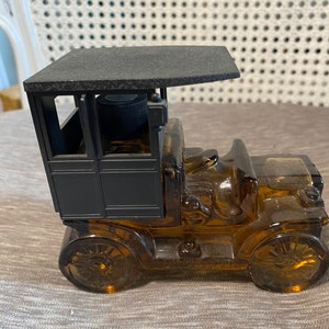 Vintage - Bottiglia Avon - Anni '70 - Replica di un'auto del 1910 - Profumo Ooland - Vettura in vetro marrone - Parte superiore in plastica nera (coperchio) - Piena di dopobarba