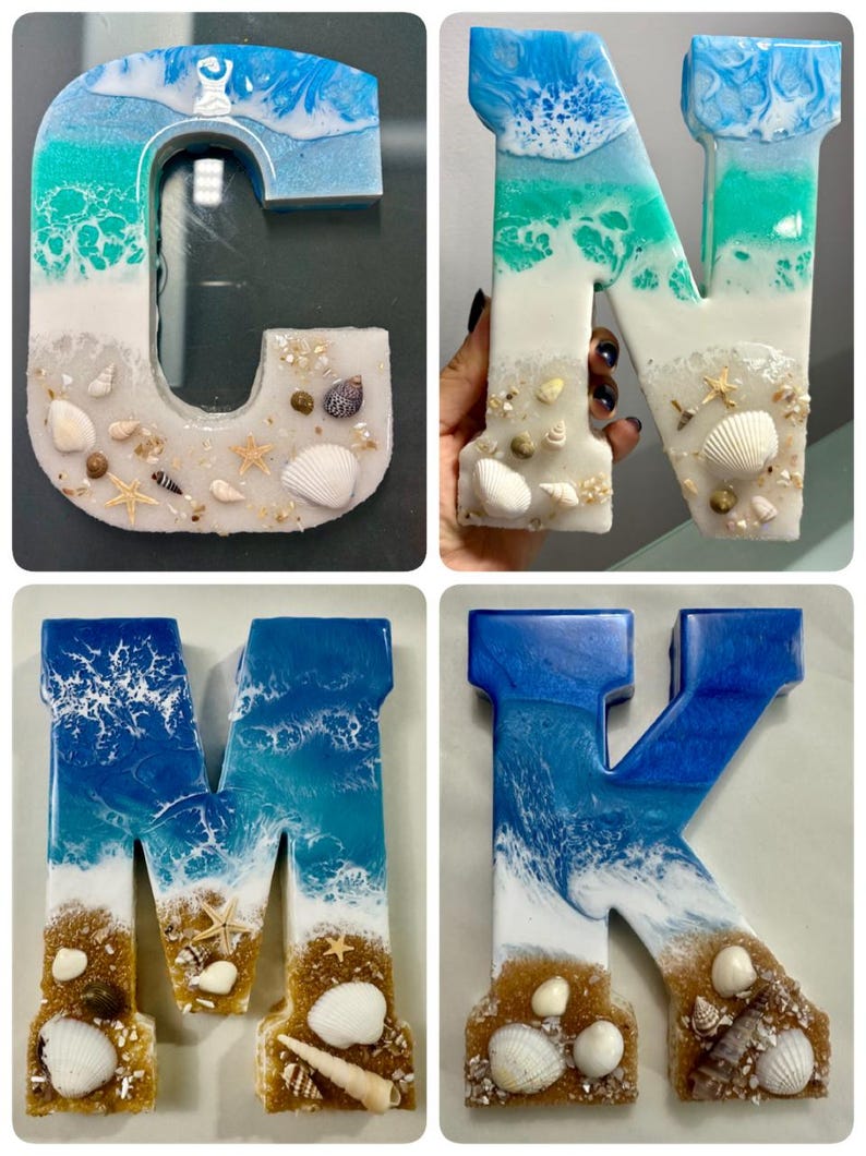May include: Resin letters C, N, M, and K, each with a unique beach-themed design. The letters feature blue, green, and white resin, resembling ocean waves and sand. Adorned with seashells and starfish, these decorative letters are perfect for coastal decor.