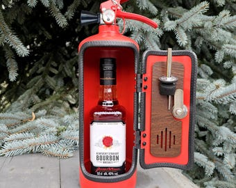 May include: A red fire extinguisher shaped liquor dispenser with a wooden door that opens to reveal a bottle of Kentucky Straight Bourbon Whiskey. The dispenser has a gauge on the top and a small spout on the side.