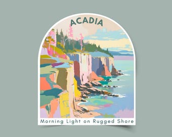 May include: A sticker with a vibrant illustration of the Acadia coastline. The image depicts cliffs, trees, and the sea under a blue sky. The text "ACADIA" is at the top, and "MORNING LIGHT ON RUGGED SHORE" is at the bottom.