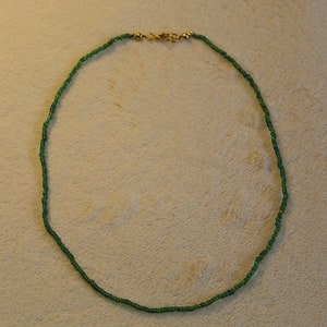 Emerald green and gold necklace