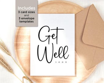 May include: A white card with black calligraphy that reads "Get Well Soon". The card is sitting on a wooden tray with a brown envelope.