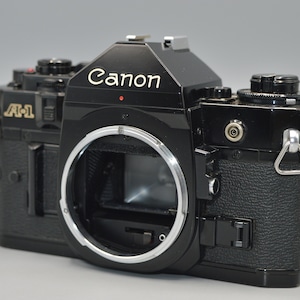 Canon A1 Vintage SLR 35mm Film Camera With F/1.8 50mm Prime Canon A1 Vintage SLR 35mm Film Camera With F/1.8 50mm Prime