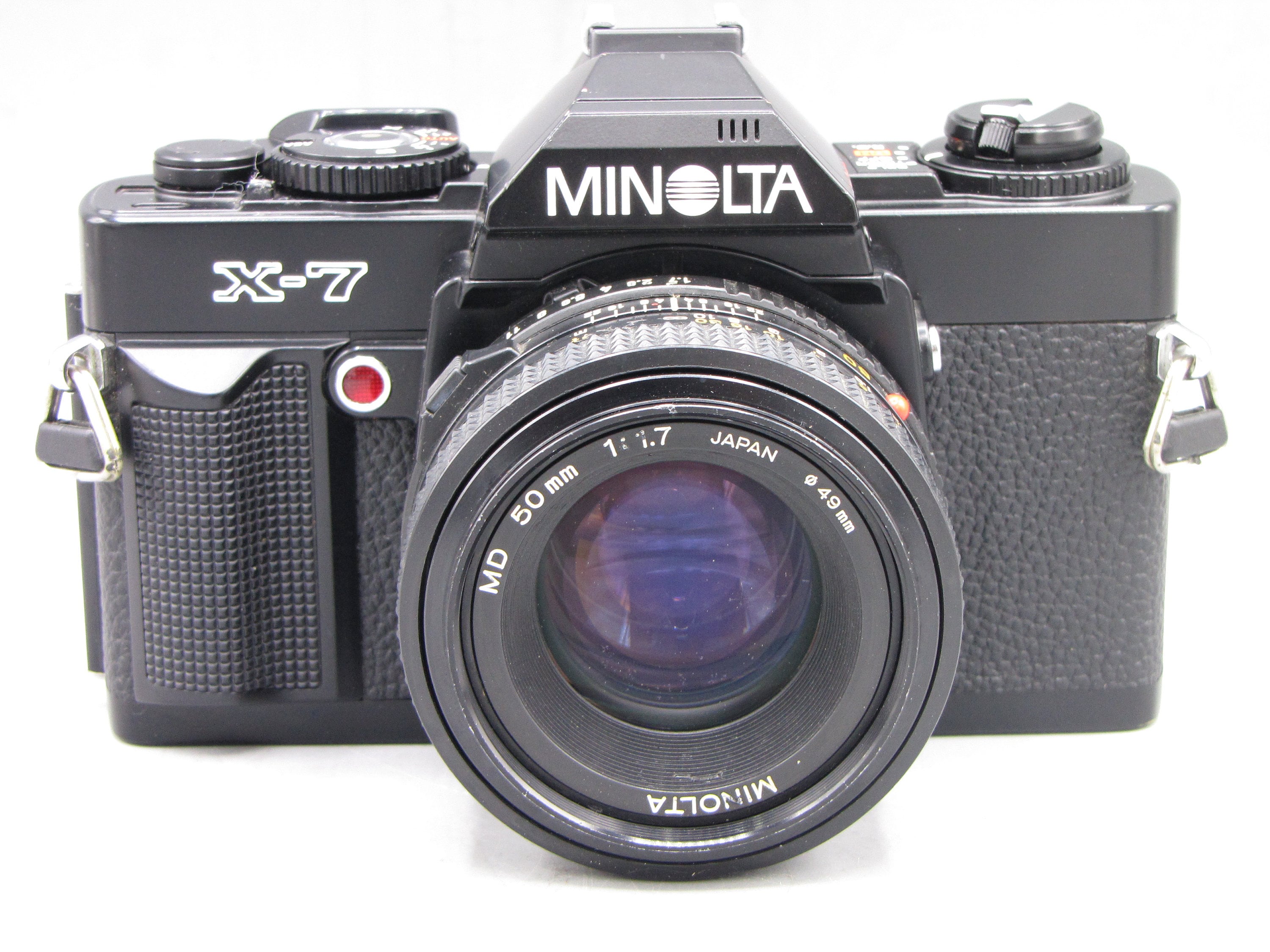 MINOLTA　X-7 Vintage Minolta X7 35mm SLR Film Camera W 1.7/50 Clad Seals