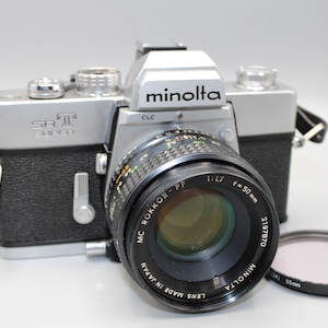 Minolta SRT101 35mm slr camera w 50mm lens sr. 1177927 clad tested