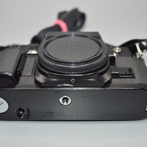Vintage Canon Ae-1 Camera With Lens In Camera Bag With Accessories