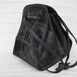 "Bolsa de estribo" de piel de cocodrilo auténtica capturada en la naturaleza