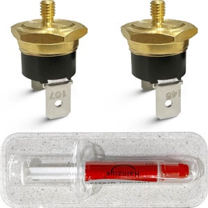 以下が含まれることがあります： 黒いキャップと「149」と「107」のラベルが付いた銀色の金属タブが付いた、金色をしたサーモスタットが2つ。透明なプラスチックパッケージには、「Haenzuife」というラベルが付いた赤と白のチューブも含まれています。