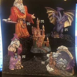 May include: A set of five ceramic figurines depicting a wizard, a castle, a dragon, and a fantasy scene. The figurines are painted in various colors, including purple, blue, green, and gold. The figurines are all different sizes, ranging from 7 inches to 15 inches tall. The figurines are labeled with their corresponding numbers and heights.