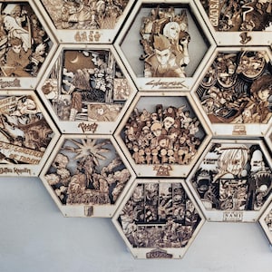 May include: A series of wooden hexagonal panels, laser-cut with detailed illustrations of anime and manga characters. The panels are arranged in a honeycomb pattern, displaying various scenes and characters from different series.