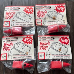 May include: Four vintage Miracle Spout milk carton pourers, each packaged with a red spout and a cardboard display card. The cards feature the text "Miracle Spout" and "New" in a red burst, with instructions and a price of 39¢.