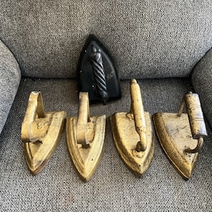 5 Antique Gold Cast Iron Sad Flat Clothes Iron Amish #6, 7 One Black