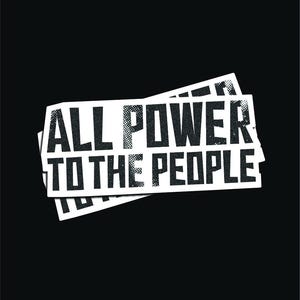 May include: A white sticker with black text that reads "ALL POWER TO THE PEOPLE". The sticker is slightly crumpled and has a distressed look.