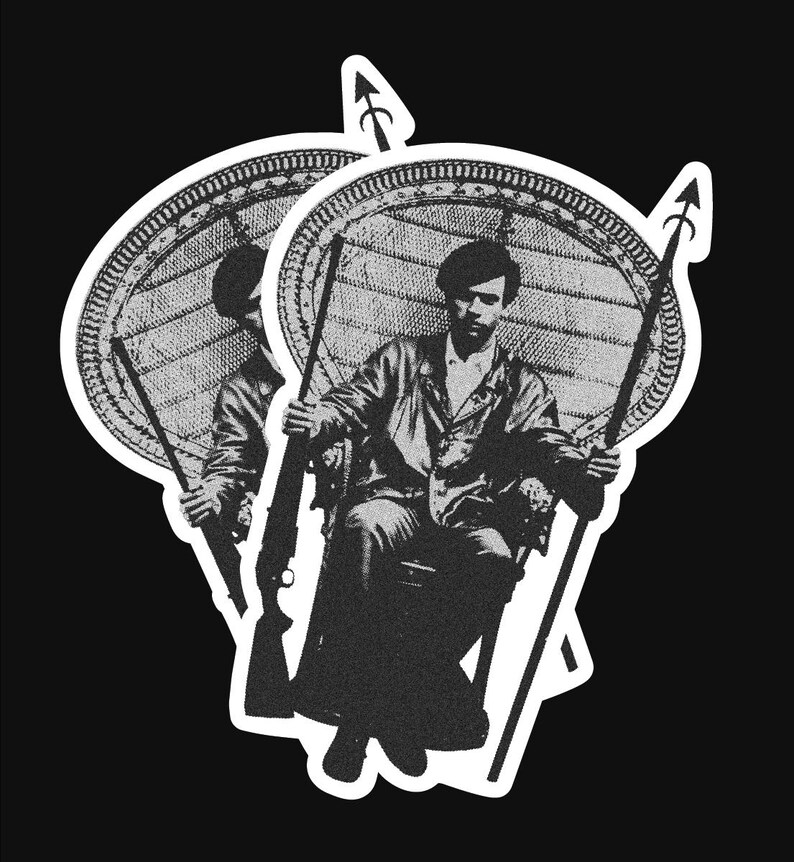 May include: Black and white illustration of a person sitting in a wicker chair holding a rifle. The person is wearing a jacket and has a serious expression on their face. The image is surrounded by a white border.