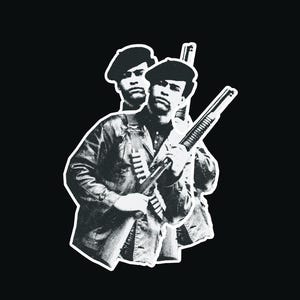 May include: Black and white photograph of a man holding a shotgun. He is wearing a beret and a jacket. The photo is cropped to show only the man and the gun.